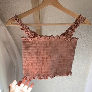Cropped, ruffle pink Reformation top